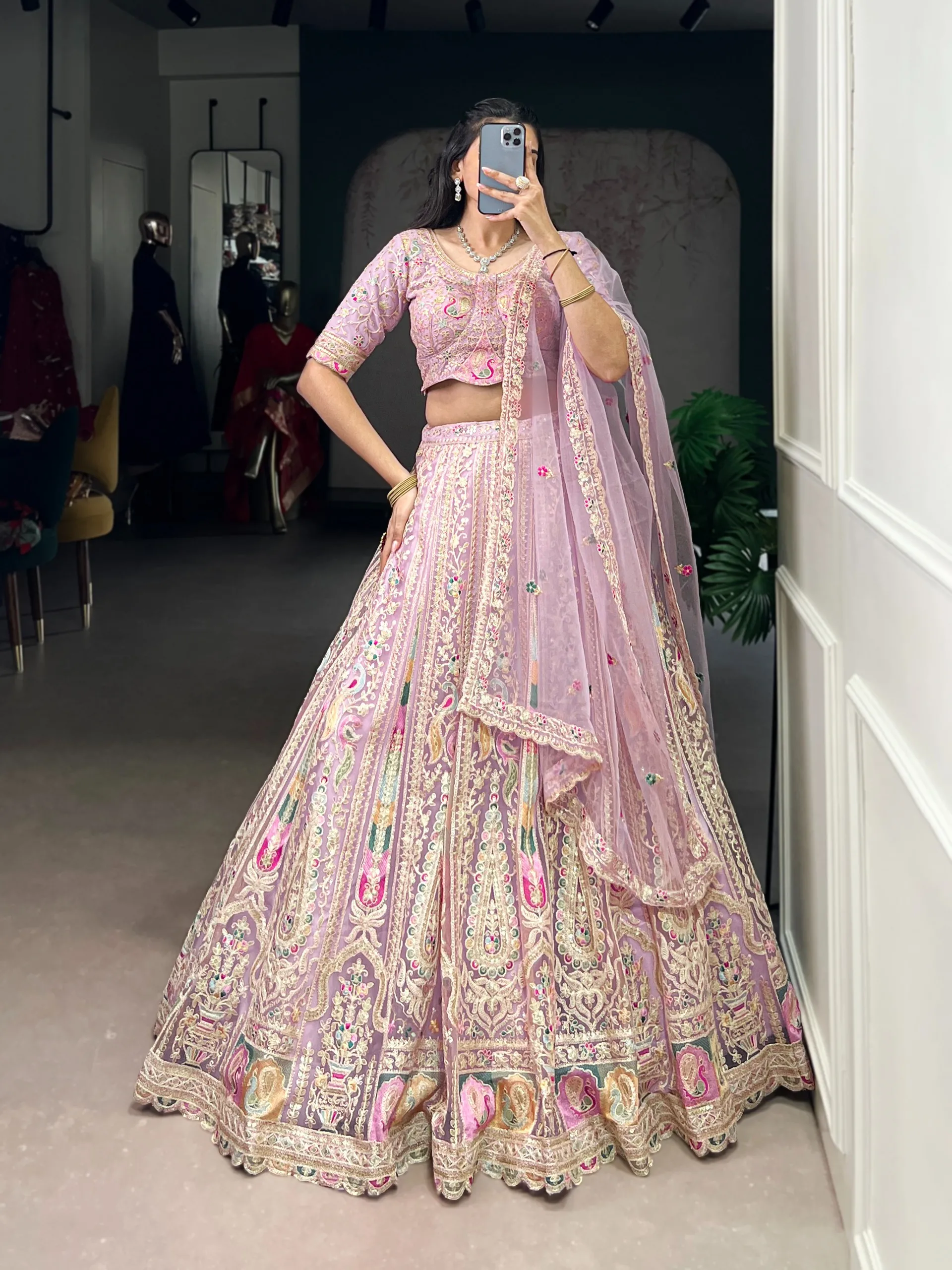 Sabella Net catalog embroidery lehenga wholesale - Sanvari Fashion